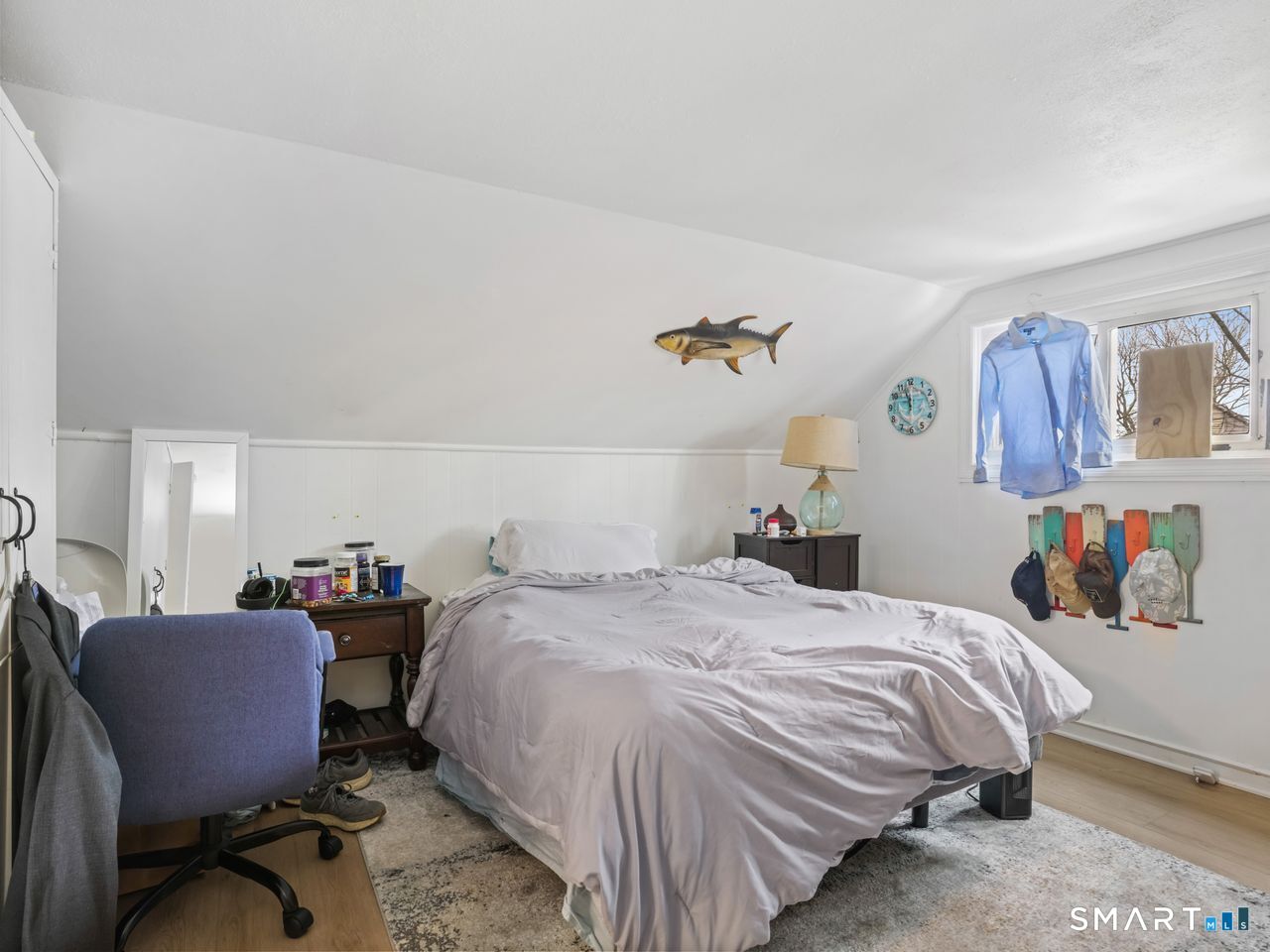 69 Seaver Circle Bridgeport, CT 06606 - Photo 25 of 29 a bedroom with a bed workspace and window