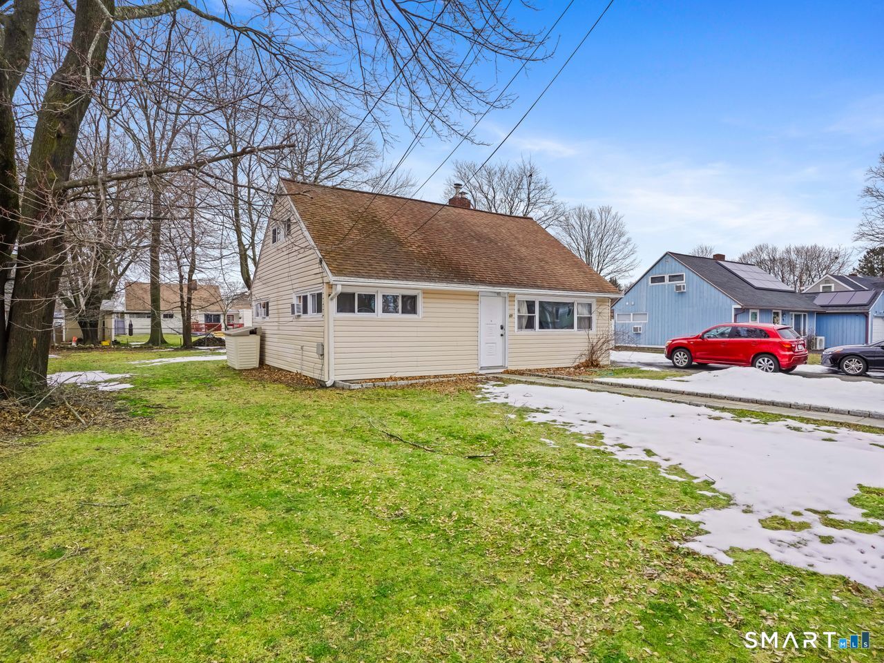 69 Seaver Circle Bridgeport, CT 06606 - Photo 3 of 29 front view of house with a yard