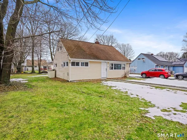 front view of house with a yard