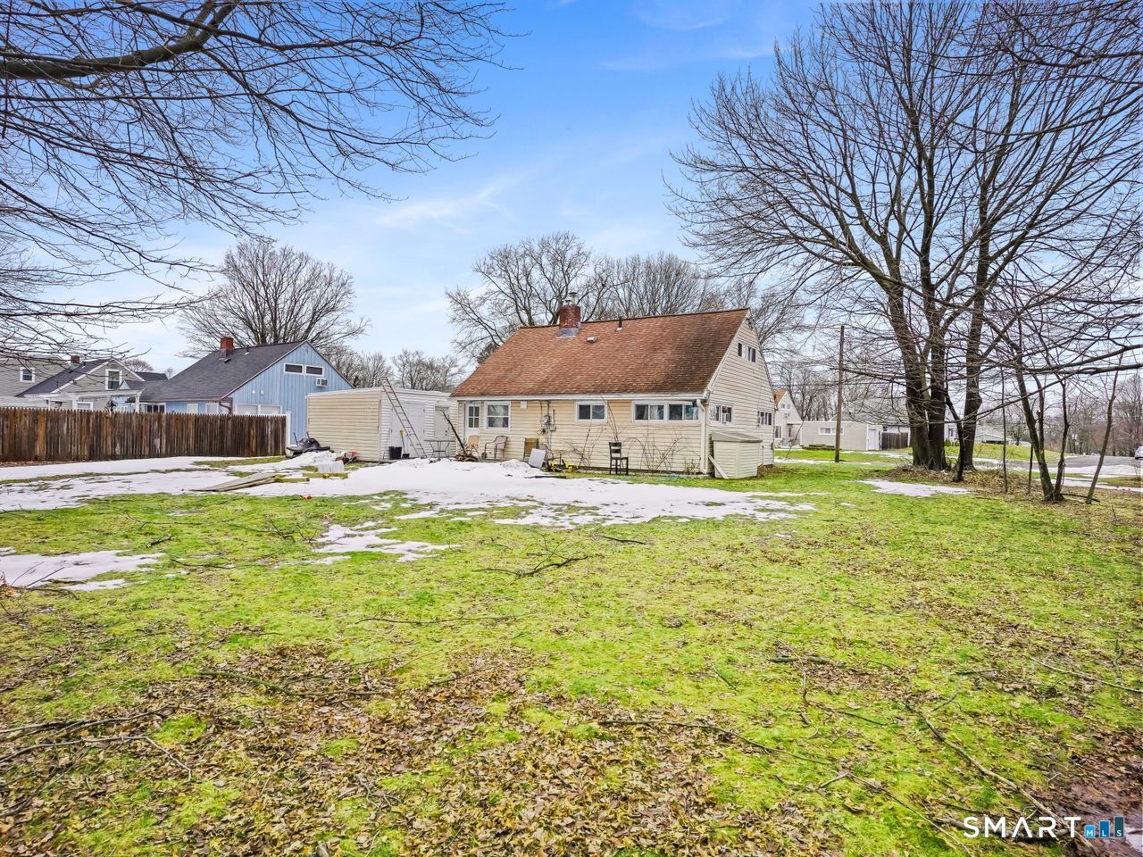 69 Seaver Circle Bridgeport, CT 06606 - Photo 5 of 29 a swimming pool with outdoor seating