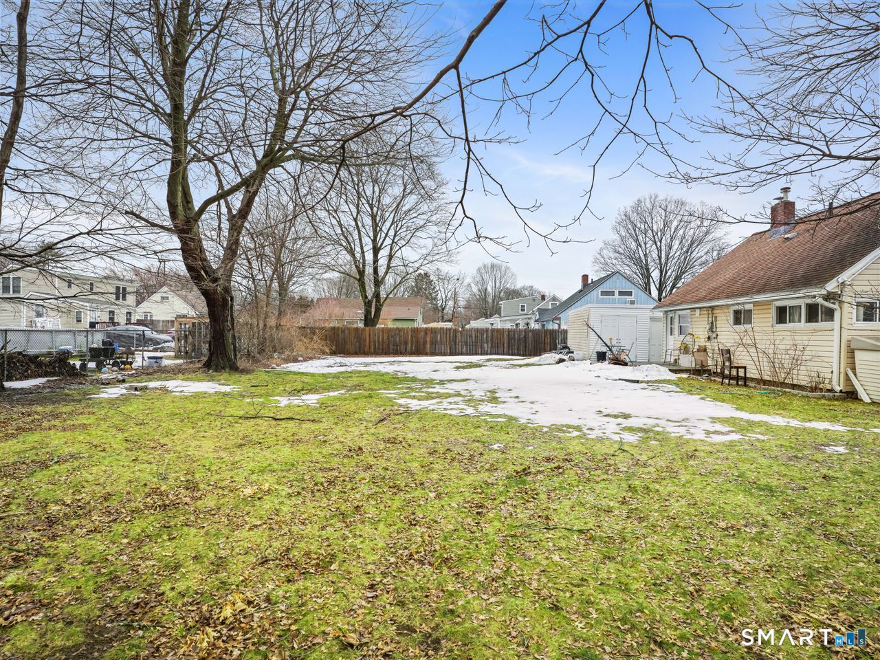 69 Seaver Circle Bridgeport, CT 06606 - Photo 8 of 29 a view of yard with swimming pool and large tree