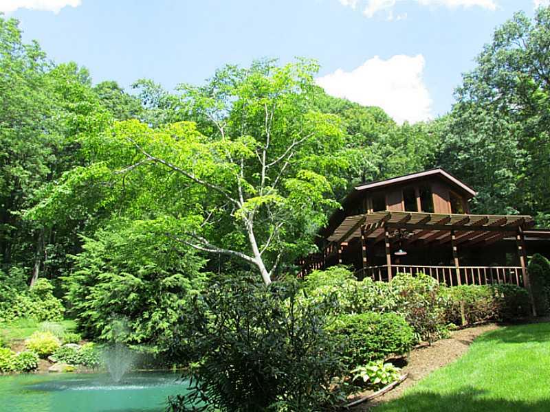 157 Cabin Road Normalville, PA 15469 - Photo 2 of 25 Exterior Front. Spring fed pond is used for swimming, fishing, and rafting!