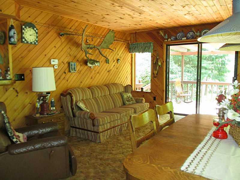 157 Cabin Road Normalville, PA 15469 - Photo 12 of 25 Den/Family/Great Room. Sliding door leads to front deck