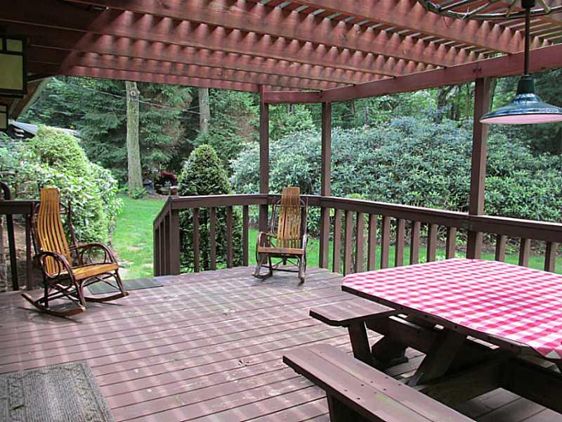 157 Cabin Road Normalville, PA 15469 - Photo 14 of 25 Patio/Deck. Enjoy the front yard from here!