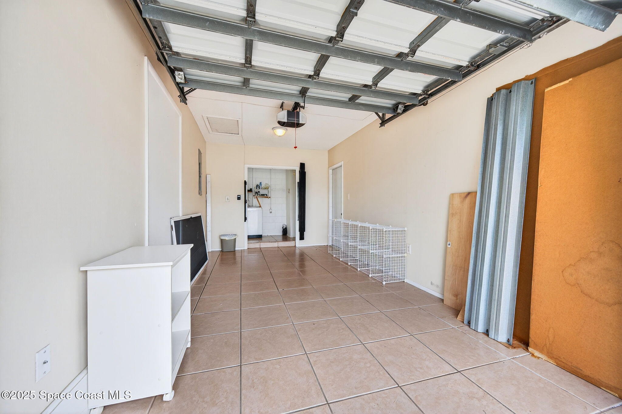 2135 Otterbein Avenue Cocoa, FL 32926 - Photo 24 of 28 a view of a hallway with entryway and furniture