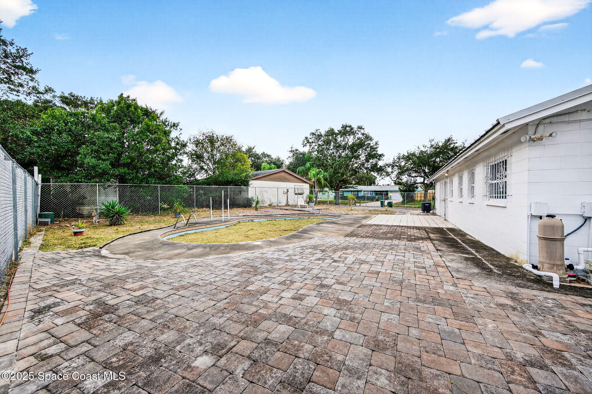 2135 Otterbein Avenue Cocoa, FL 32926 - Photo 25 of 28 a view of swimming pool with a backyard