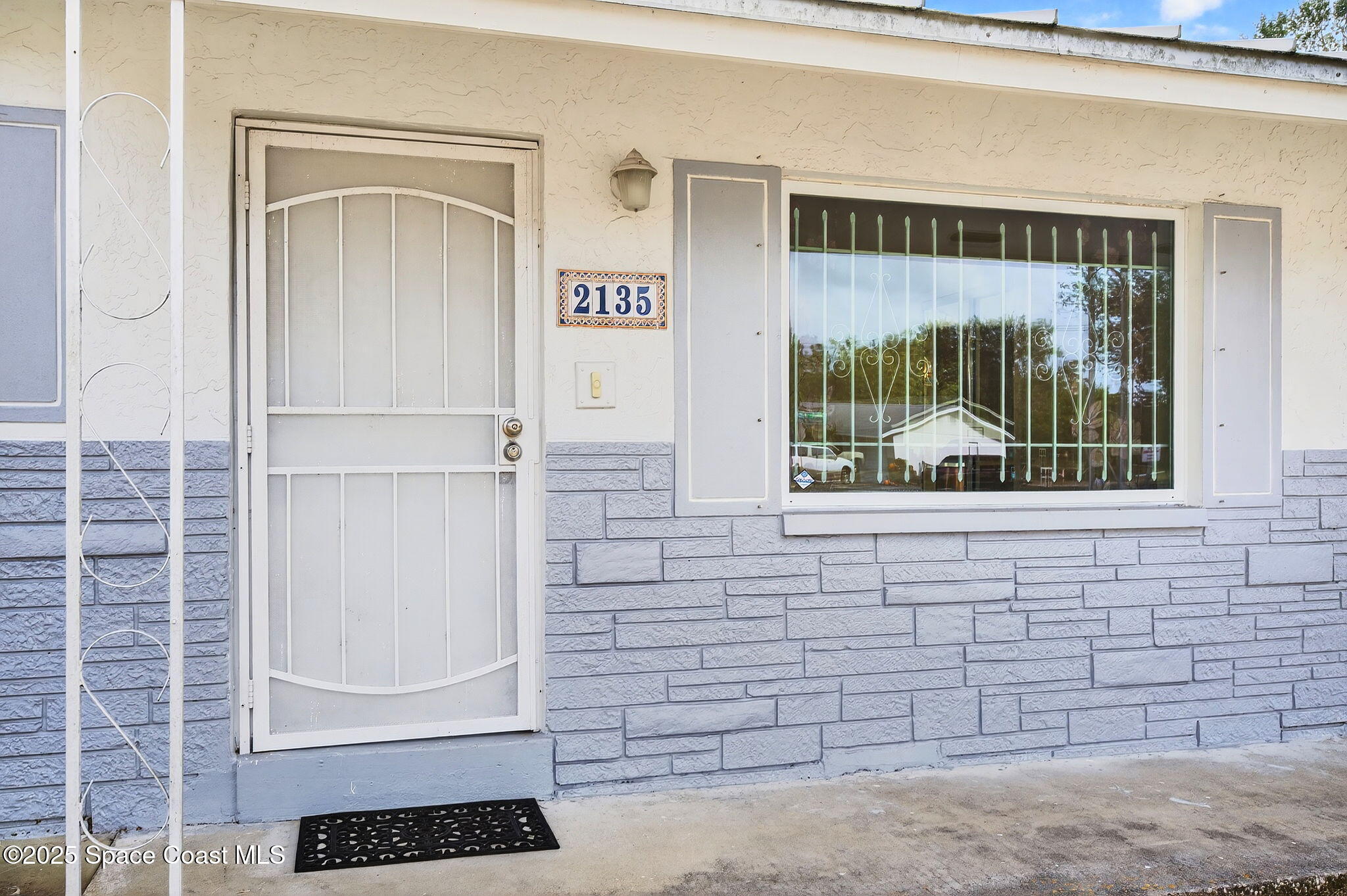 2135 Otterbein Avenue Cocoa, FL 32926 - Photo 6 of 28 a picture of door