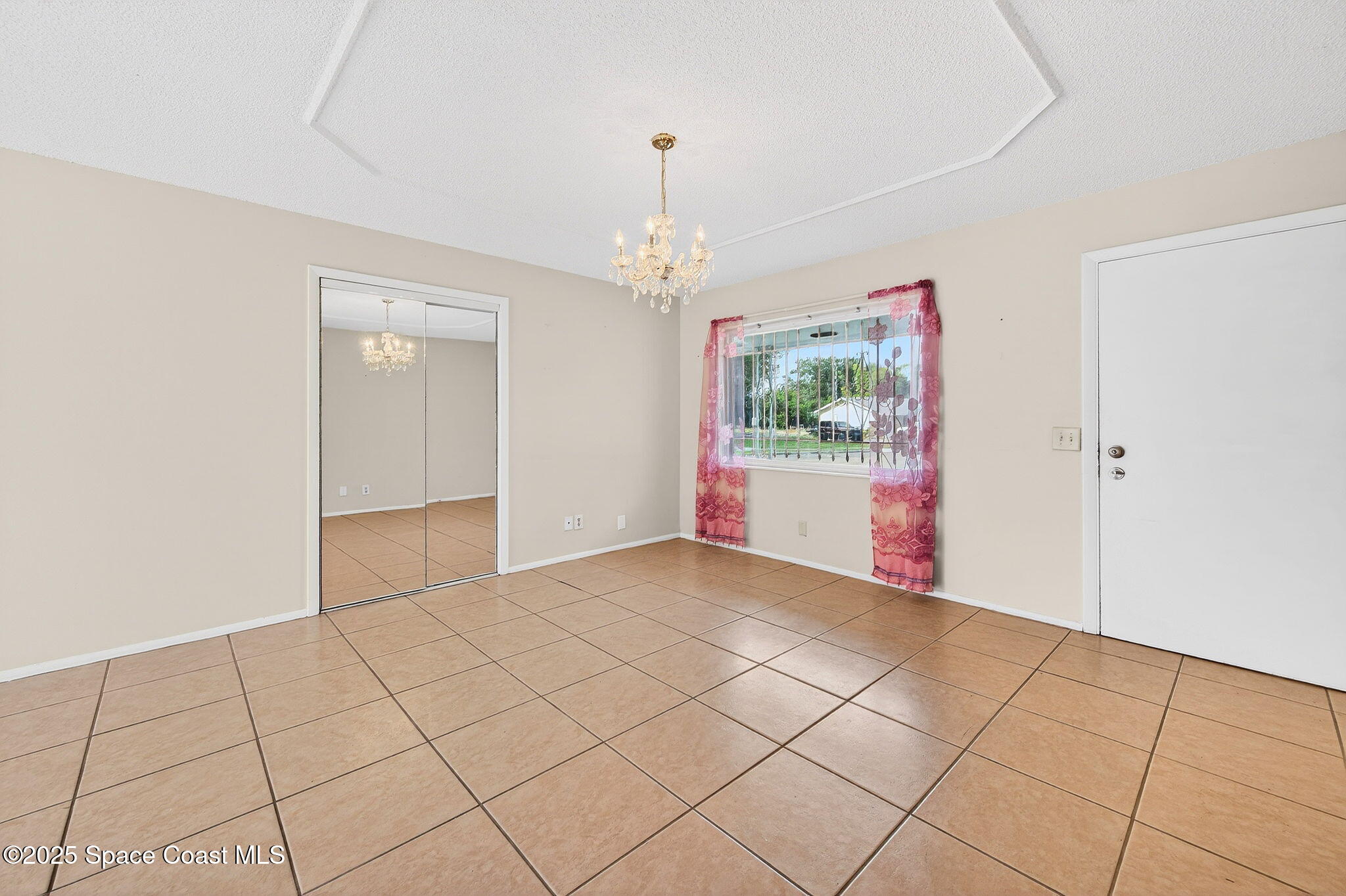 2135 Otterbein Avenue Cocoa, FL 32926 - Photo 8 of 28 a view of an empty room and window