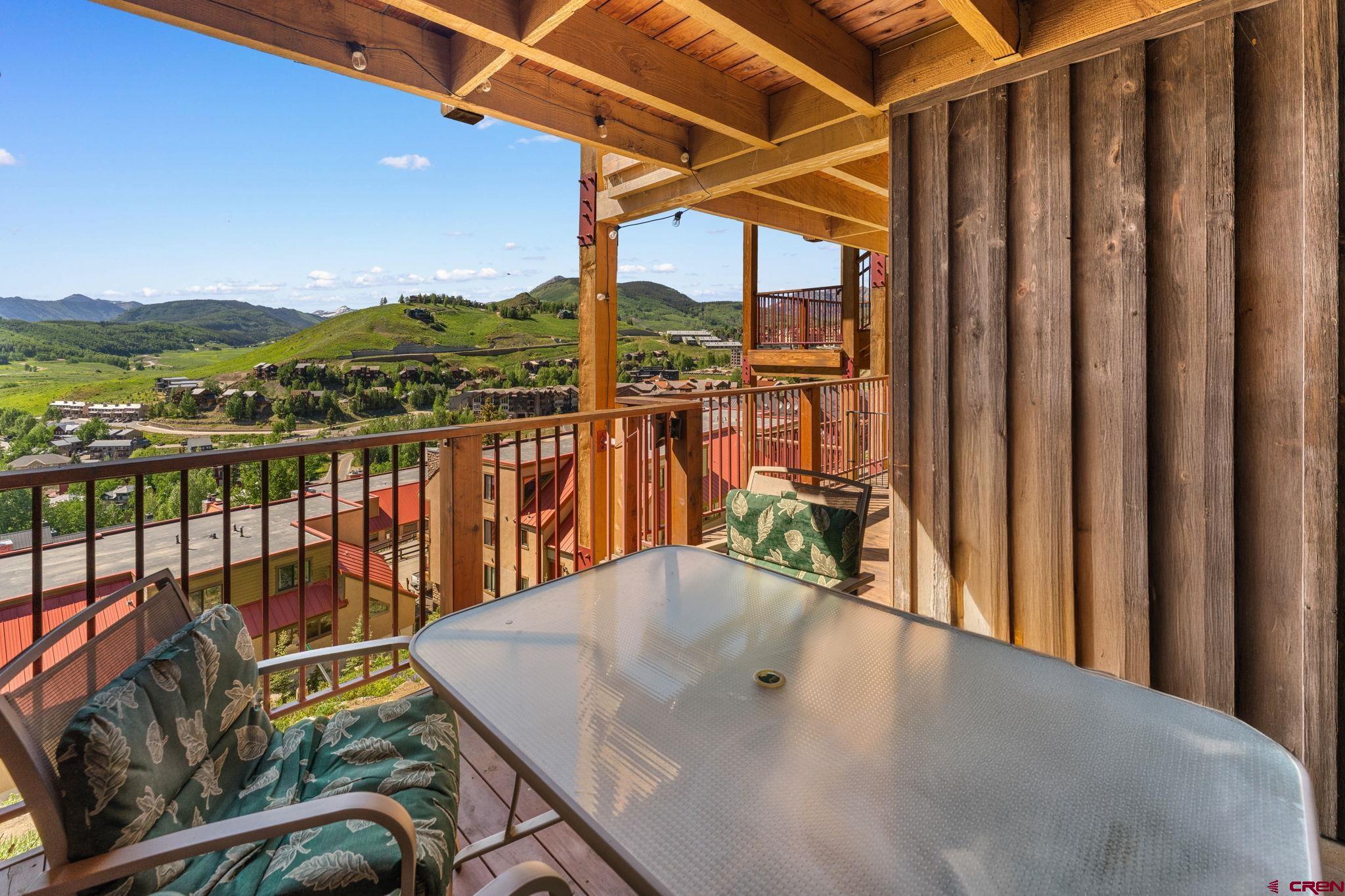 72 Hunter Hill Road, Unit I204 Crested Butte, CO 81225 - Photo 9 of 44 a view of a balcony with lake view and a ocean view