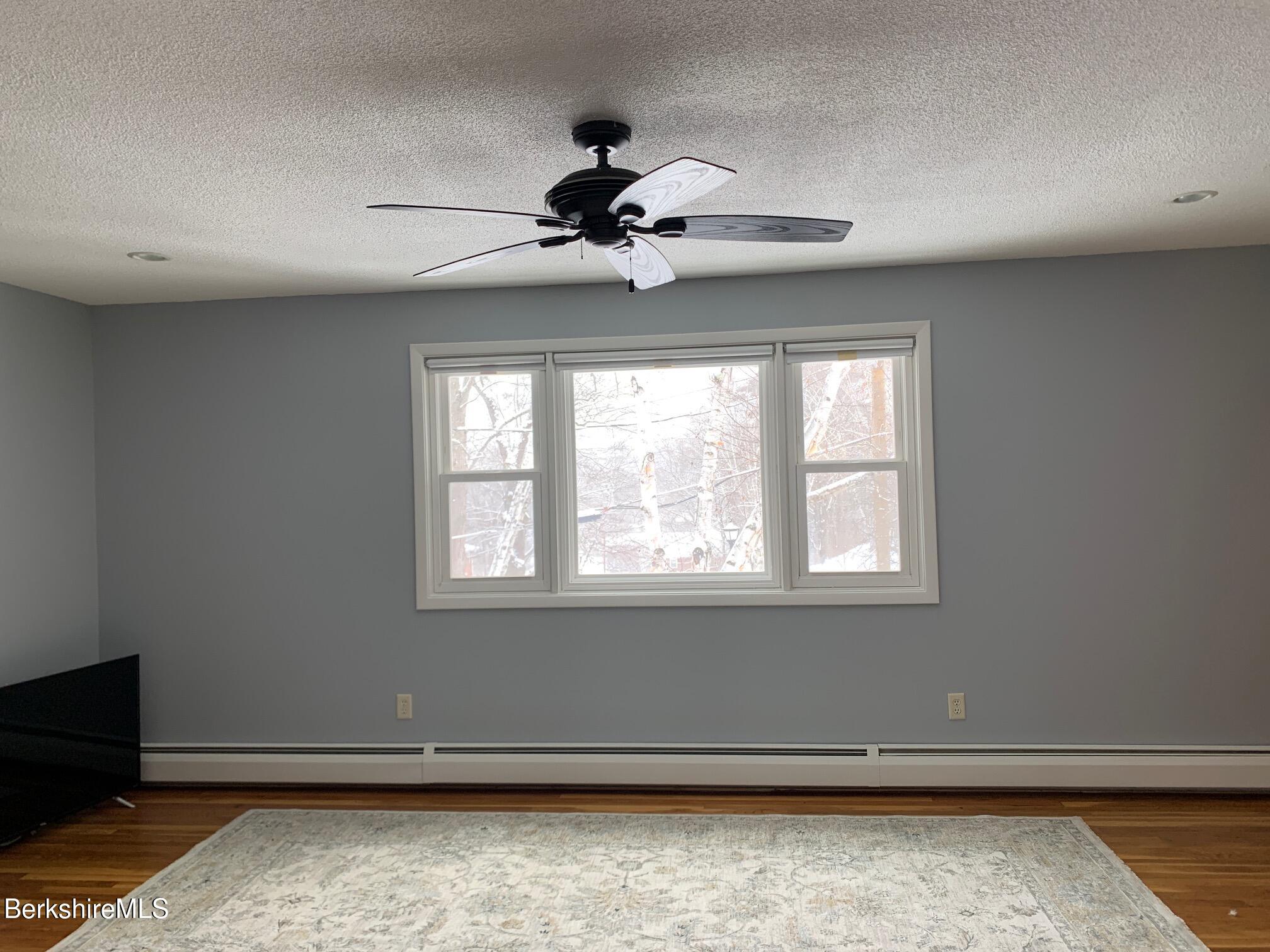 4 Morgan Manor, Unit 4 Lenox, MA 01240 - Photo 5 of 14 a view of an empty room with a window