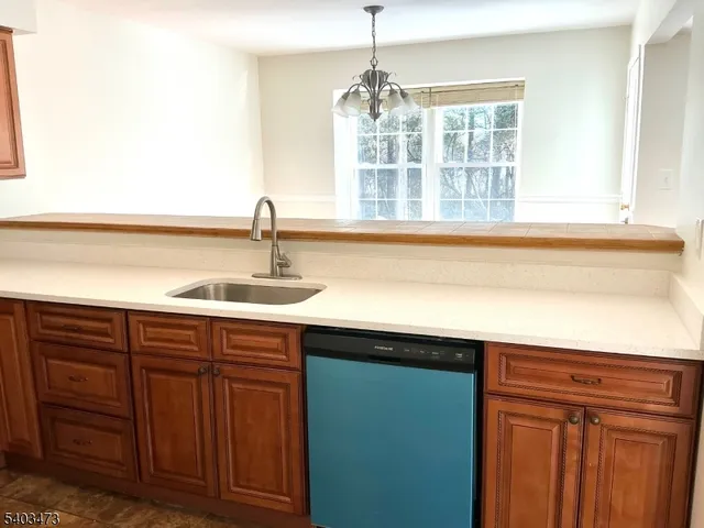 a close view of a sink and a window