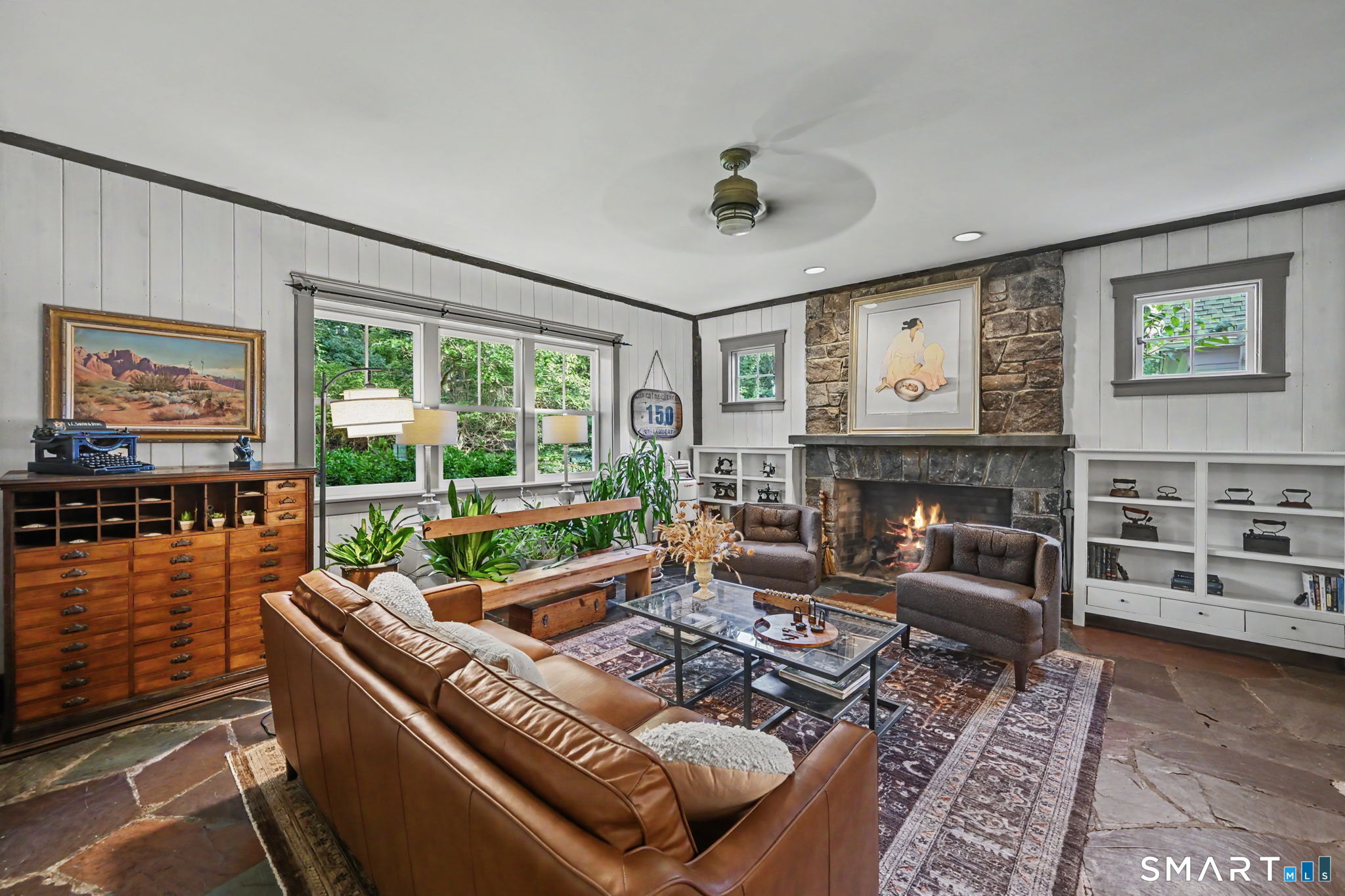 143 Chestnut Hill Road Wilton, CT 06897 - Photo 19 of 40 Family Room with original stone fireplace and built-ins