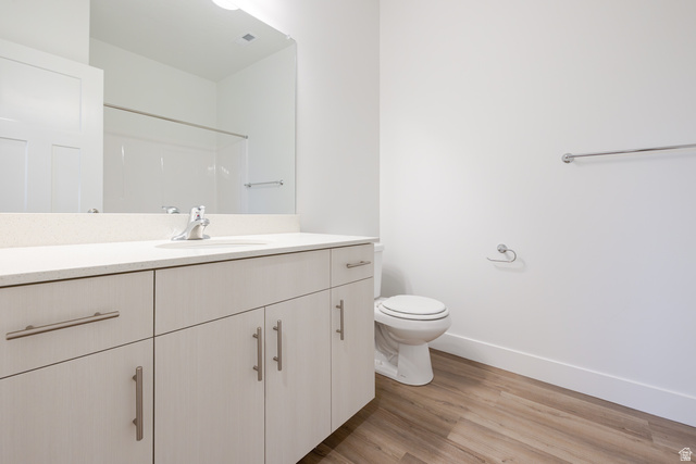 4661 Poplar Way, Unit R304 Mapleton, UT 84664 - Photo 6 of 17 Full bath with vanity and light wood finished floors