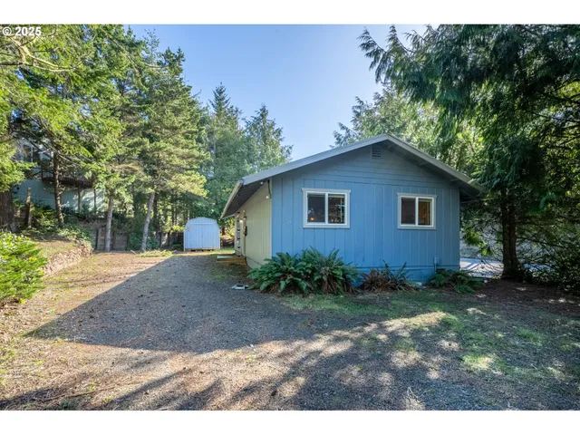 a view of backyard of a house
