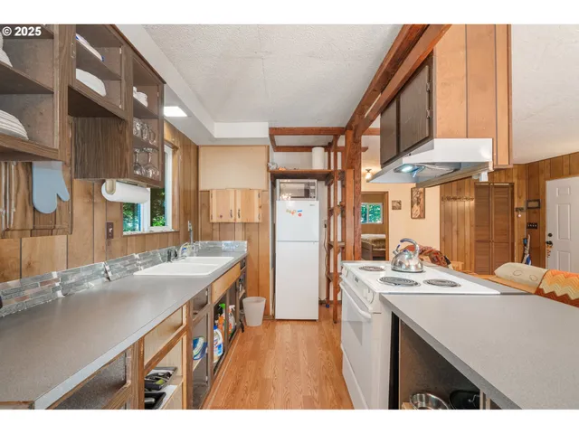 a bathroom with a sink a double vanity and a mirror