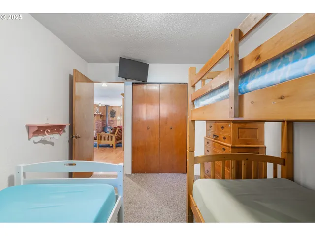 a bedroom with a bed and a walk in closet