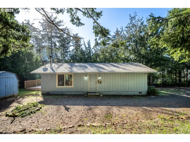 a view of a house with a garden