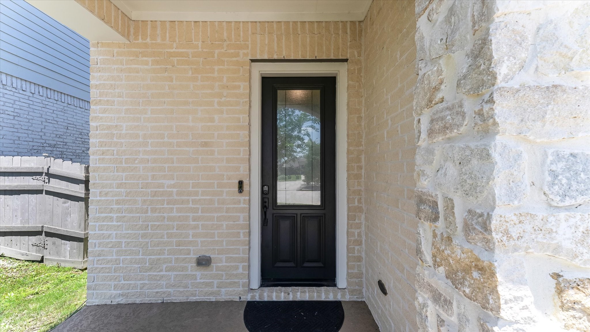 15607 Rising Wren Court Conroe, TX 77302 - Photo 4 of 40 a view of a wooden door of the house