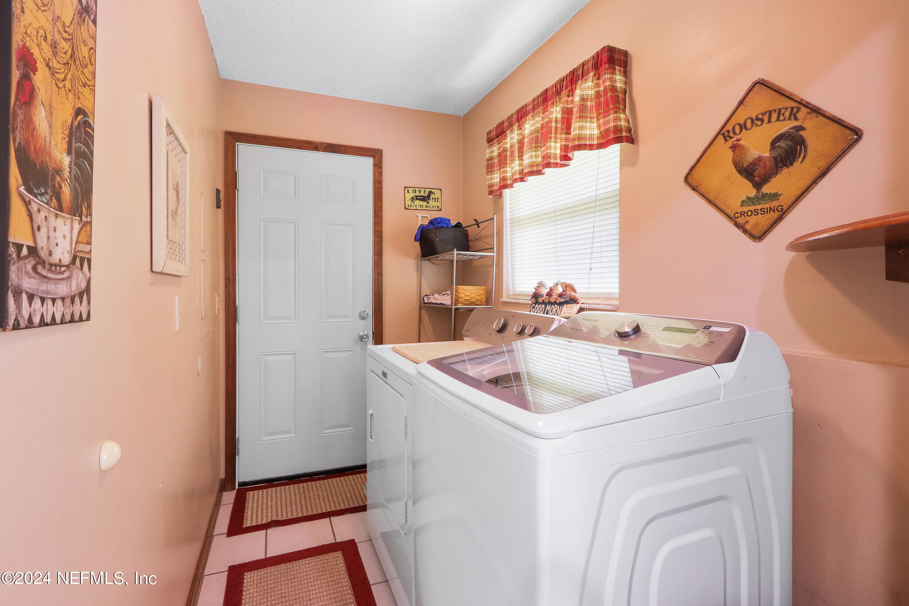 912 Ridgeway Court Orange Park, FL 32065 - Photo 29 of 41 Laundry and Garage Door