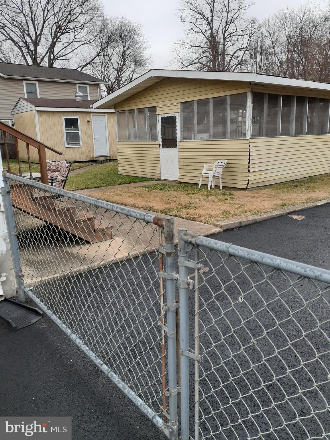 415 Delaware Avenue Baltimore, MD 21221 - Photo 3 of 13 Screened outbuilding and large shed