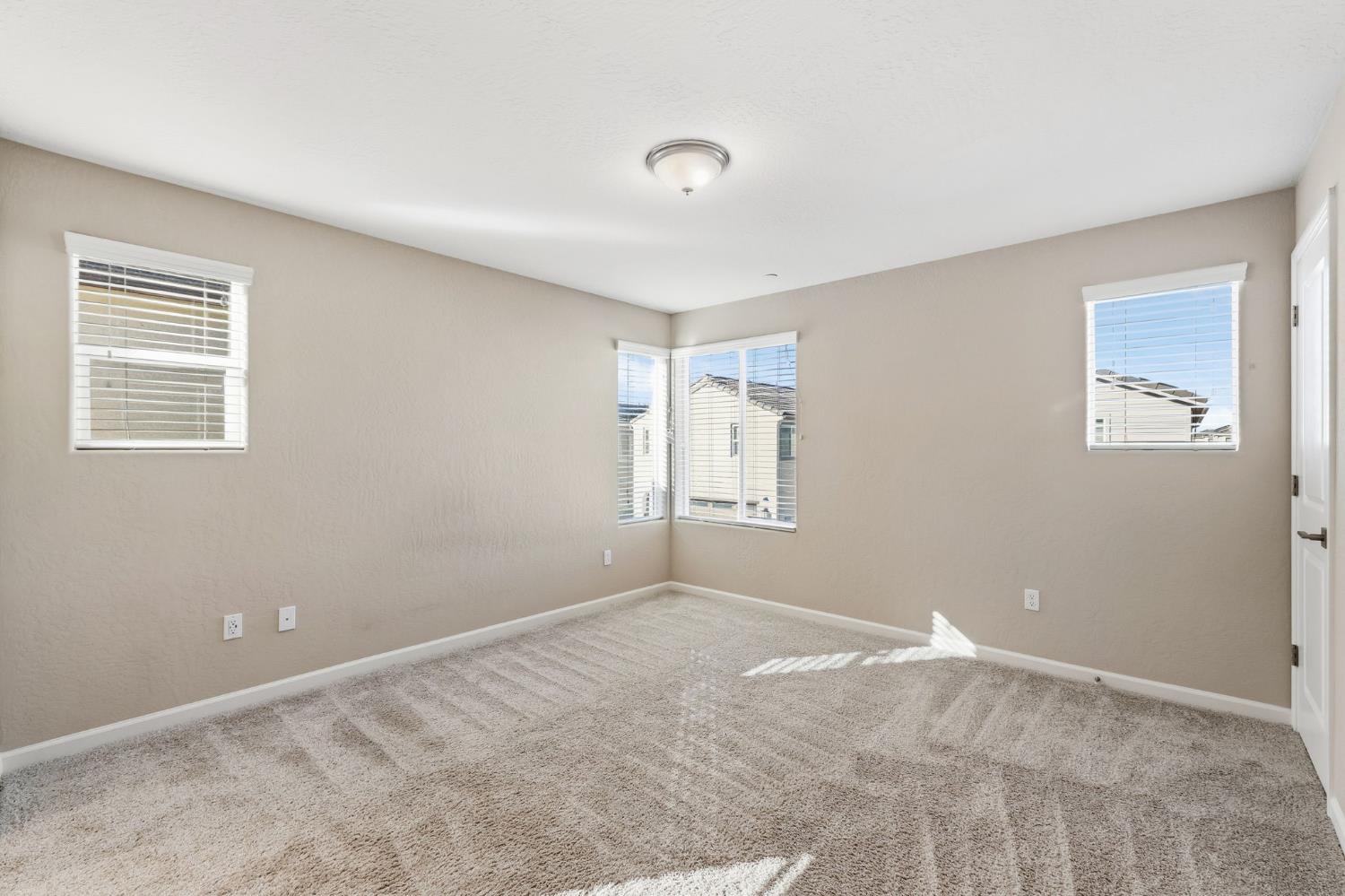 1116 Elevations Way West Madera, CA 93636 - Photo 19 of 35 a view of an empty room with a window