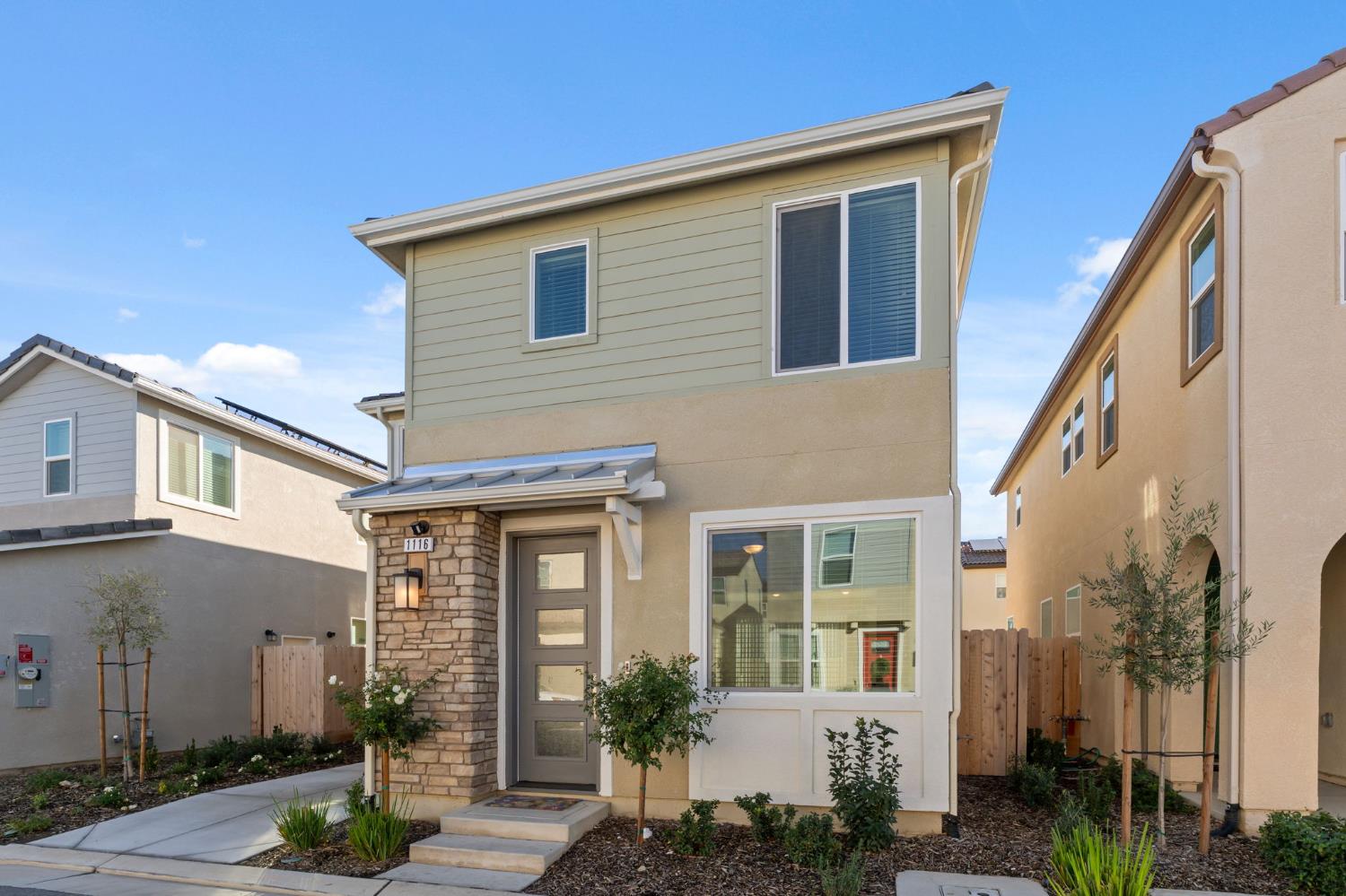 1116 Elevations Way West Madera, CA 93636 - Photo 2 of 35 a view of a house with a yard
