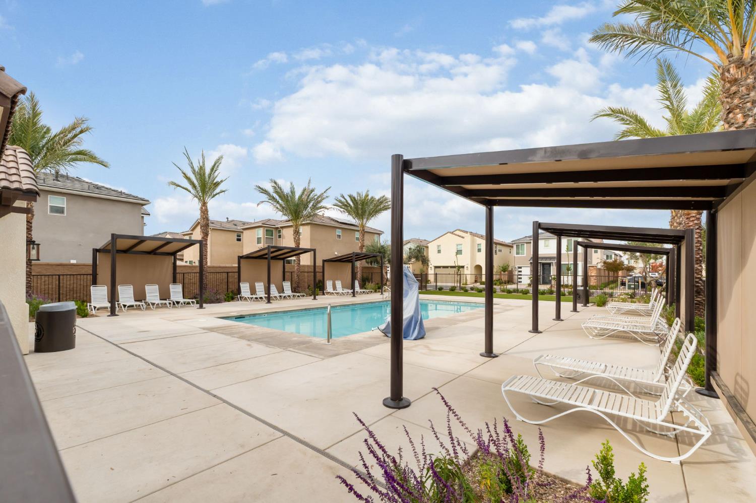 1116 Elevations Way West Madera, CA 93636 - Photo 29 of 35 a view of a house with a swimming pool and sitting area