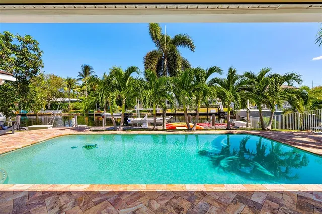 a view of swimming pool with a yard