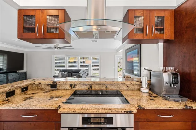 a kitchen with a stove and a sink