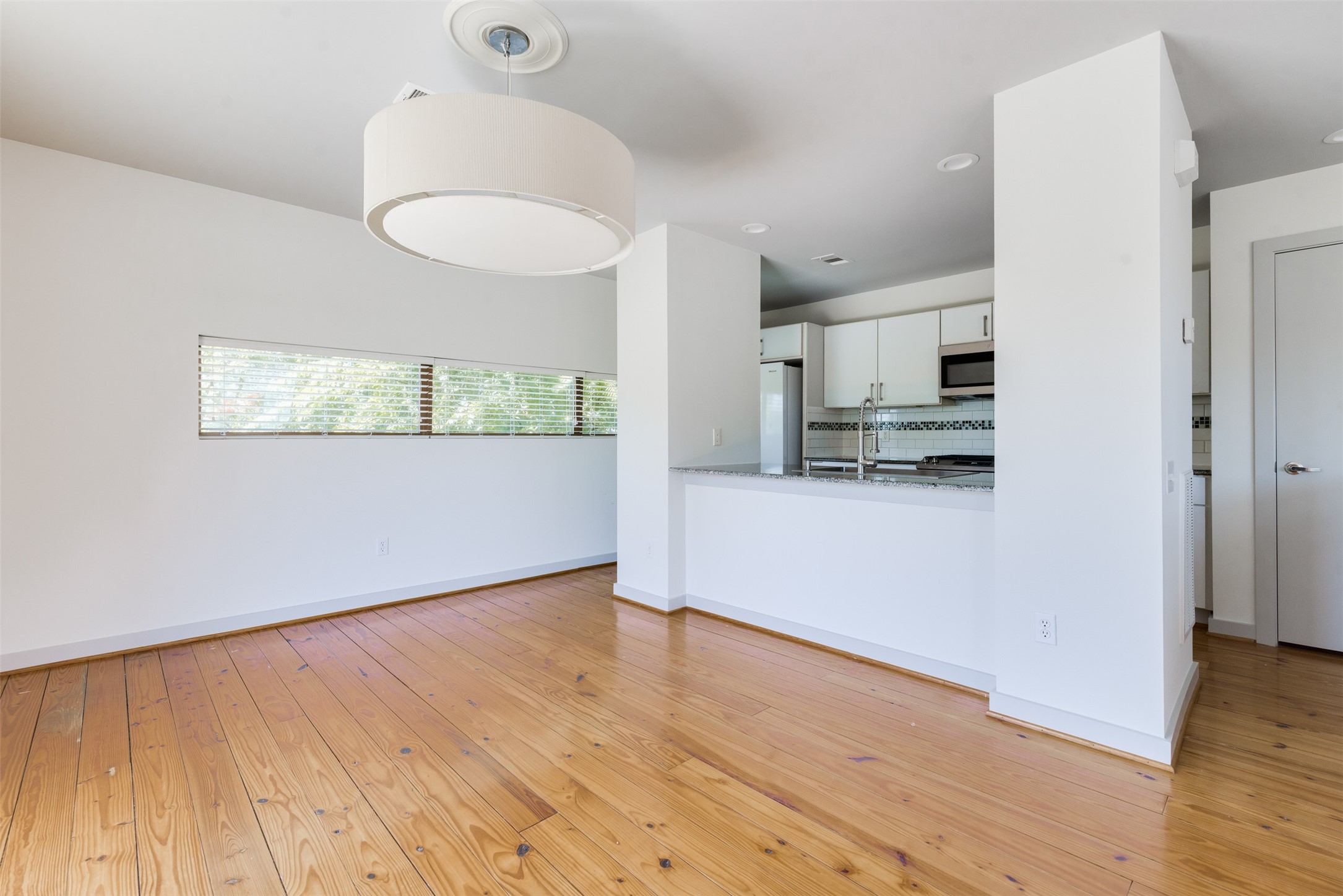 2605 Calumet Street, Unit 48 Houston, TX 77004 - Photo 16 of 34 a view of a kitchen from the hallway