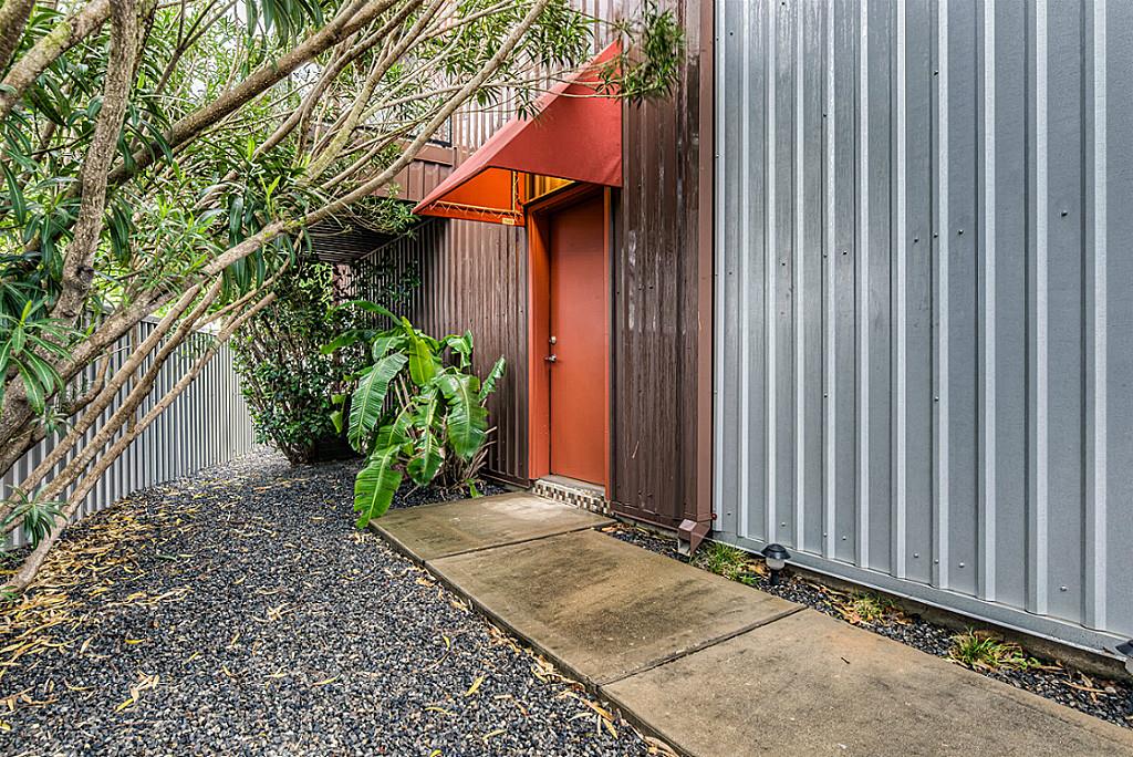 2605 Calumet Street, Unit 48 Houston, TX 77004 - Photo 2 of 34 a backyard of a house with potted plants
