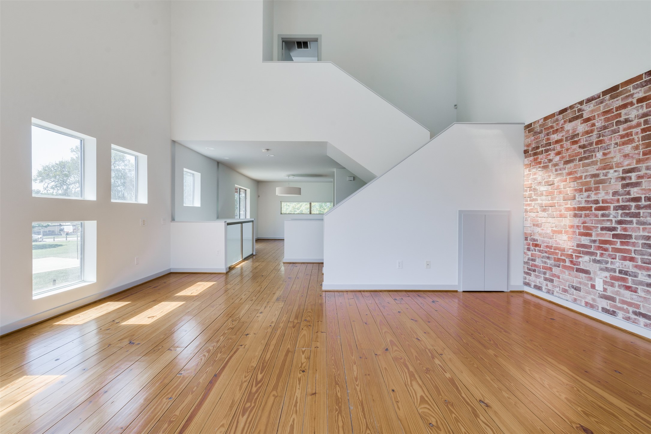2605 Calumet Street, Unit 48 Houston, TX 77004 - Photo 25 of 34 a view of empty room with wooden floor