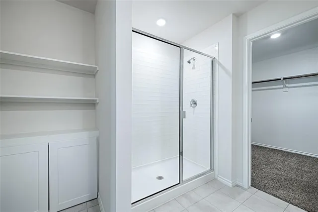 a view of a room with racks on the wall