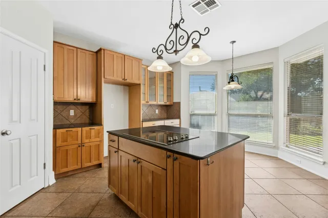 a view of a room that has a window in it