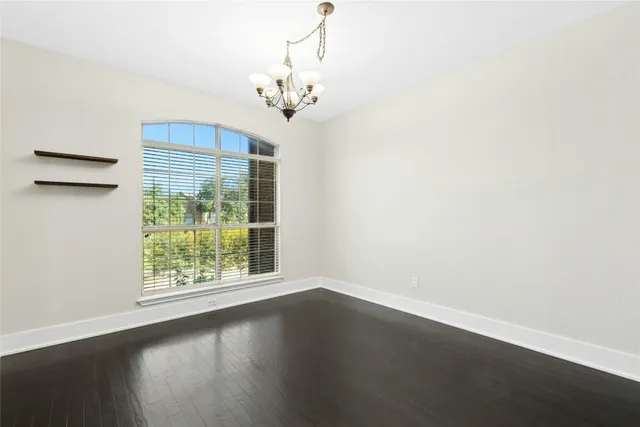 a view of livingroom and hardwood floor