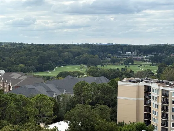 an aerial view of a house with mountain view