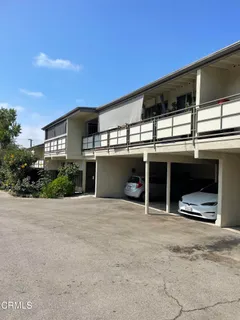 a front view of a house with a garage