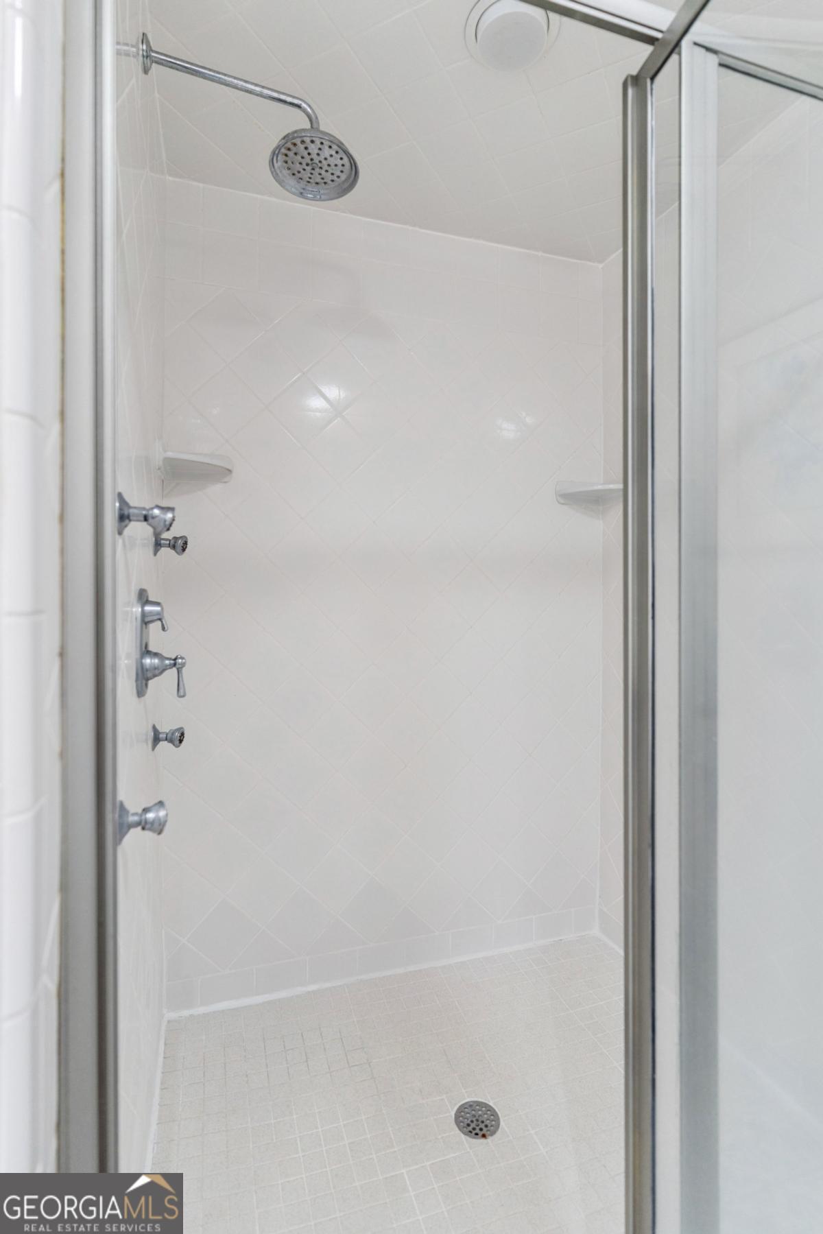 311 Dunbarton Drive St. Simons, GA 31522 - Photo 28 of 44 a close up of a bathtub