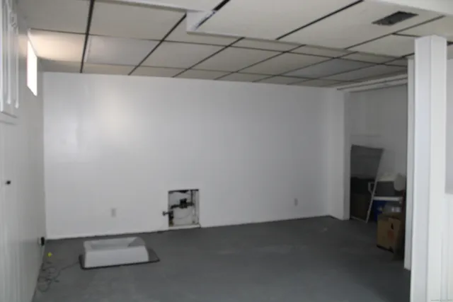 a view of a room with a storage and utility room