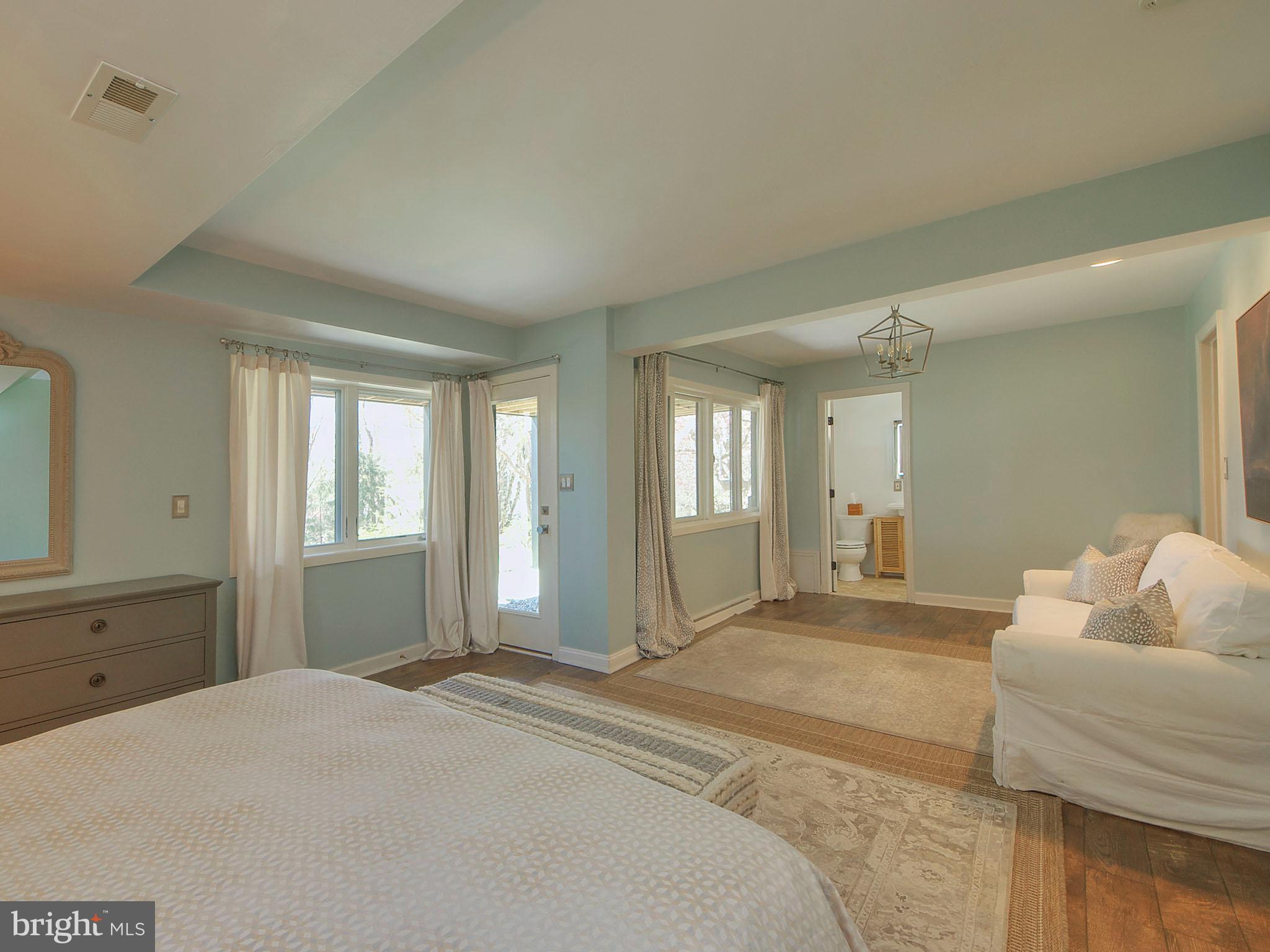 112 South Spring Valley Road Wilmington, DE 19807 - Photo 24 of 37 a spacious bedroom with a bed and a window