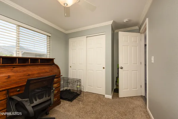 a view of room with a flat tv screen and a window