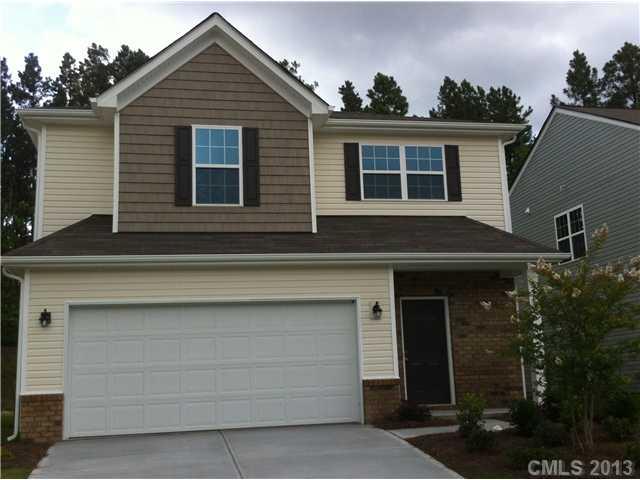 78050 Rillstone Drive Lancaster, SC 29720 - Photo 2 of 14 a front view of a house with garage
