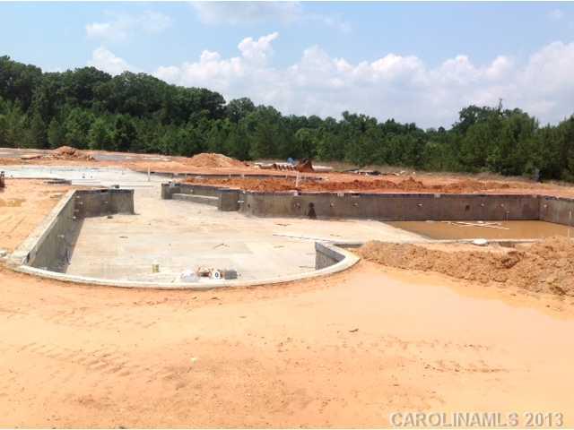78050 Rillstone Drive Lancaster, SC 29720 - Photo 14 of 14 a view of a swimming pool with a yard