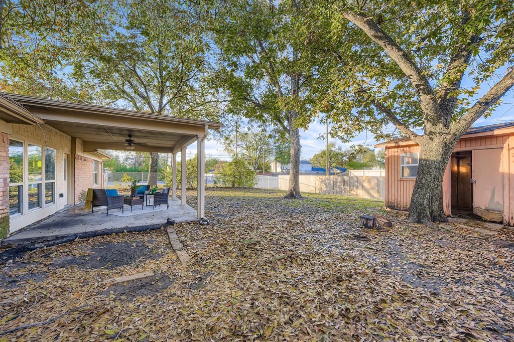 2801 Fairbrook Street Irving, TX 75062 - Photo 22 of 23 a view of a yard with a tree