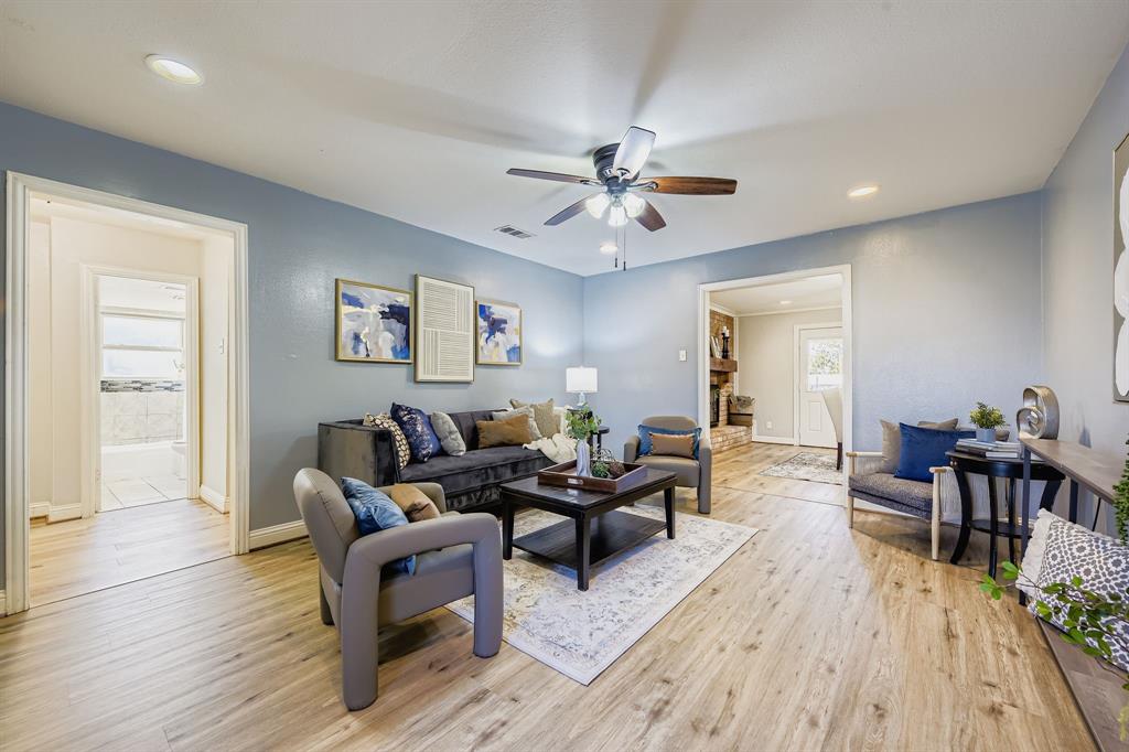 2801 Fairbrook Street Irving, TX 75062 - Photo 3 of 23 a living room with furniture and a wooden floor