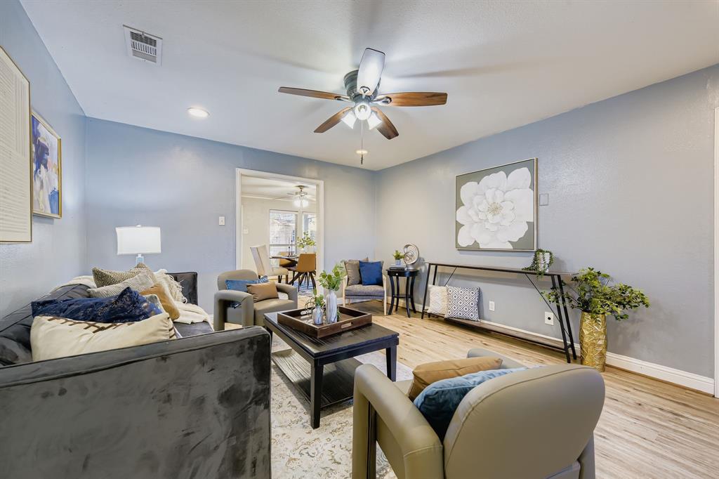 2801 Fairbrook Street Irving, TX 75062 - Photo 4 of 23 a living room with furniture chess board and a window