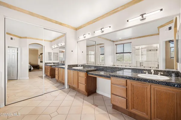 a spacious bathroom with a bathtub and a shower