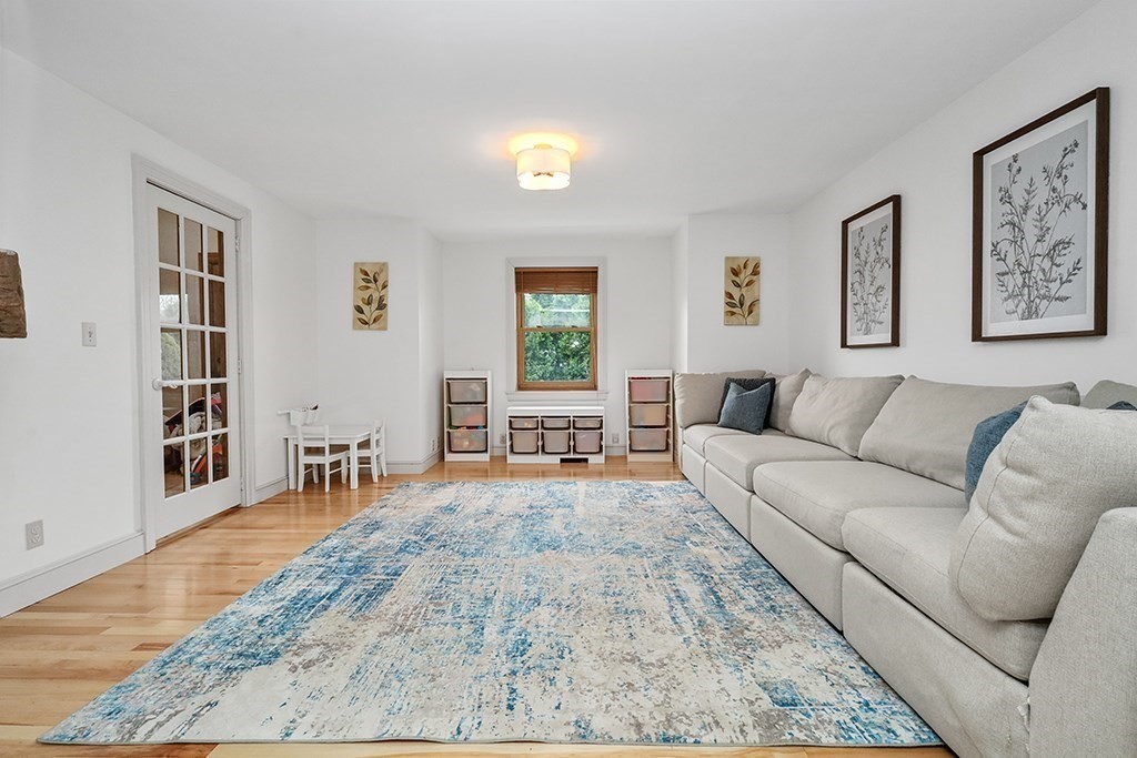 20 Maple Avenue Upton, MA 01568 - Photo 14 of 42 a living room with furniture and a wooden floor
