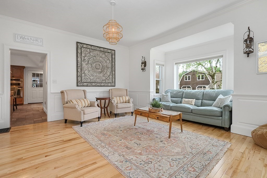 20 Maple Avenue Upton, MA 01568 - Photo 18 of 42 a living room with furniture and a rug