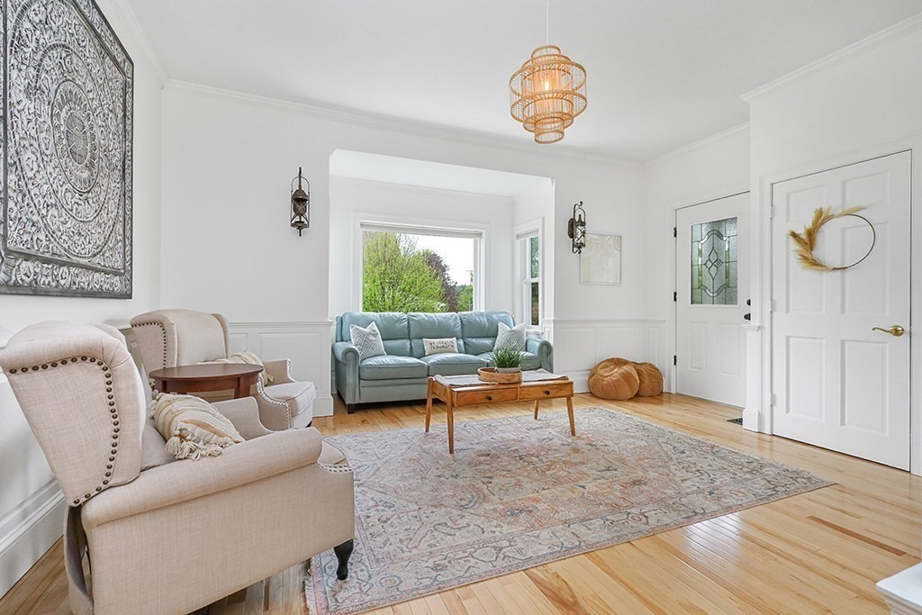 20 Maple Avenue Upton, MA 01568 - Photo 19 of 42 a living room with furniture a rug and a window